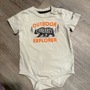 Carhartt Cream Baby Onesie with Orange Print